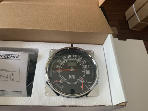 1979 Jeep CJ5 - A new speedometer gauge is shown in its packaging, alongside installation instructions.