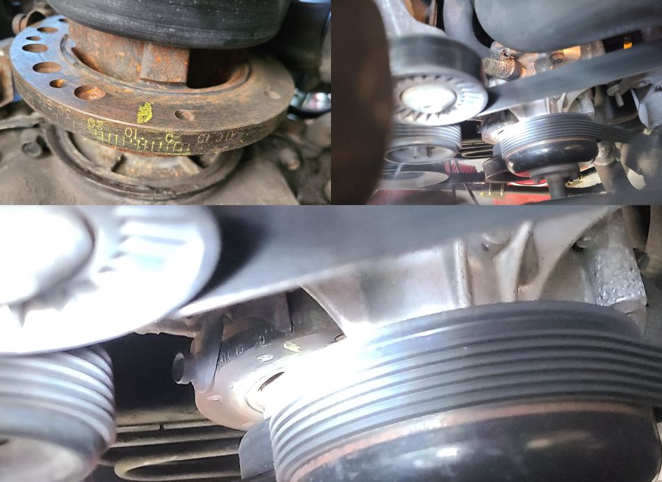Close-up of engine pulleys and serpentine belt, with some stamped markings on a pulley