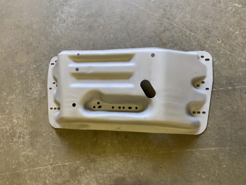 1979 Jeep CJ5 - This metal skid plate features stamped ribs and numerous mounting holes for installation.