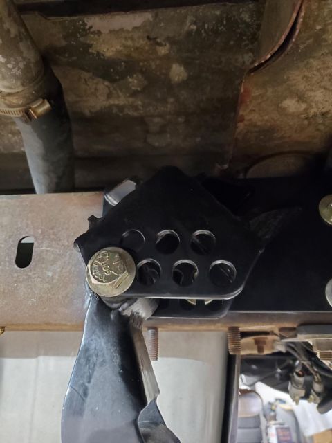 1996 Ford Bronco - Custom suspension bracket with visible Supermotors.net watermark.