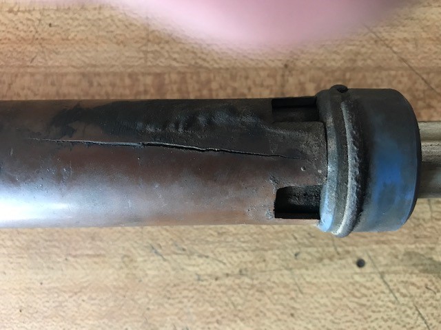 Cracked steering shaft with visible damage