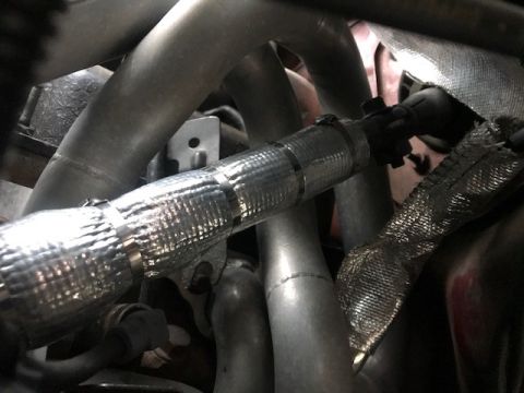 2000 Ford Explorer - Exhaust system components with heat shielding and various pipes visible.
