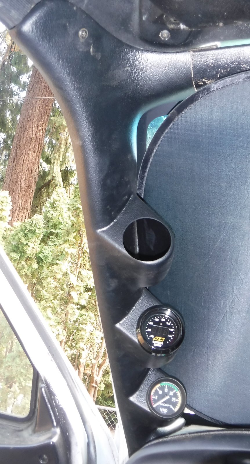 Swapped out the universal pillar pod for an AutoMeter custom fit one and added the wideband O2 gauge (bung being added soon for the sensor).