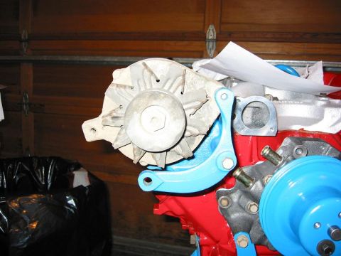 1985 Ford Bronco - Engine components, including an alternator and part of the block, are visible in this close-up shot.