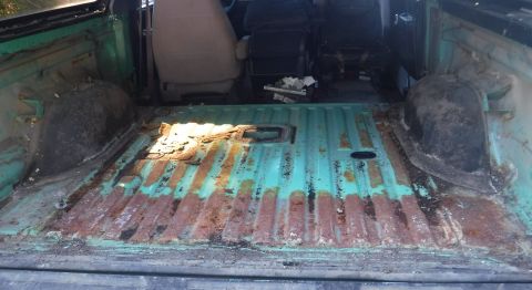 1992 Ford Bronco - Addressing rust under the rubber mats (padded backing holds water like a sponge) in conjunction with the b-pillar repair.