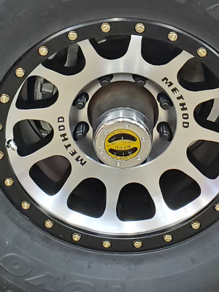Wheel with Method branding and Warn locking hub
