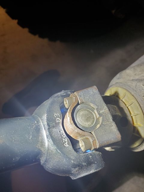 1996 Ford Bronco - Driveshaft U-joint detail, part numbers visible on the yoke.