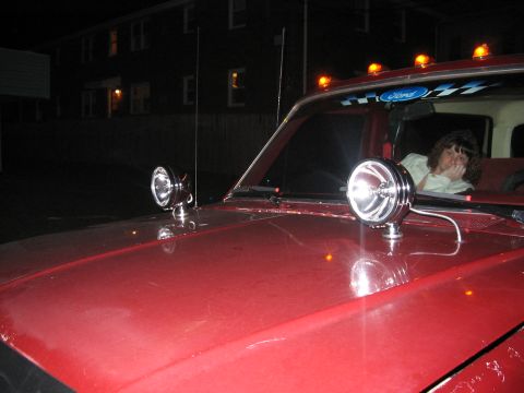 1989 Ford Bronco - minus the yellow smiley face covers, plus you can see my fiance in the cab!
