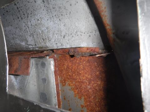 1992 Ford Bronco - B-pillar access hole cut on the passenger side. Lots of rust hiding in there!