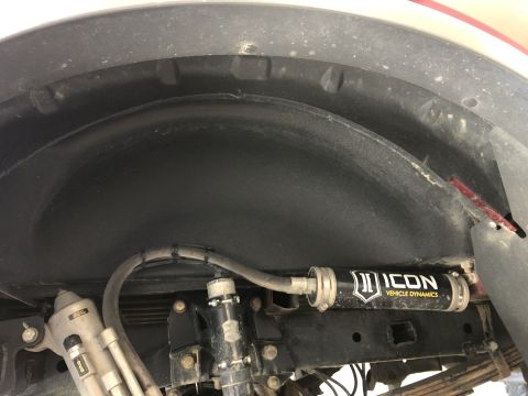 2014 Ford F-150 - This image shows the suspension system of a vehicle, specifically focusing on an Icon shock absorber and related components.