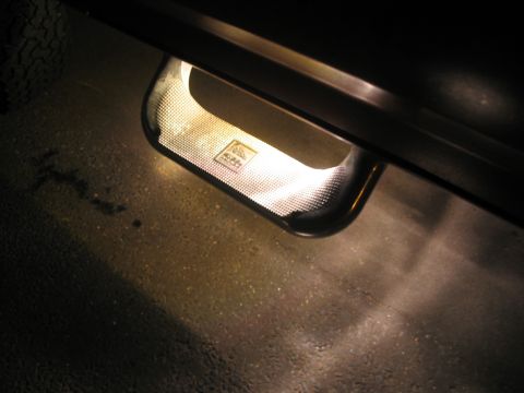 1989 Ford Bronco - rock lights illuminating steel horse step