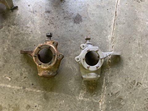 1979 Jeep CJ5 - Comparison of a rusty steering knuckle next to a newly cleaned and restored one, showing part number 620249.
