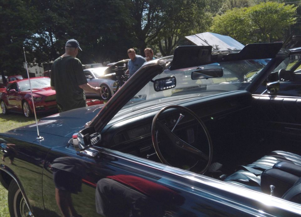 I am being interviewed by Bill, from  "Cruise-In.tv" for an upcoming broadcast  (Nov. 7) about my '69 Marquis (in the foreground).  He chose my car out of ALL the cars at this show (over 600) because he never saw a Marquis Convertible before, and was fascinated with it!
