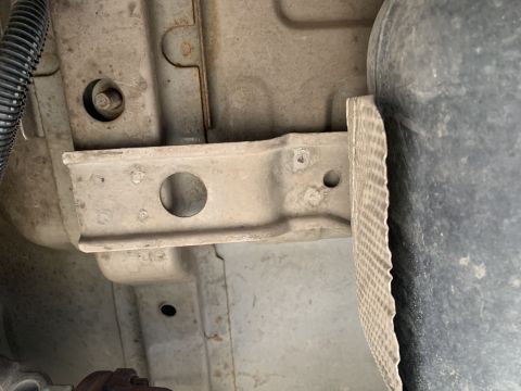 2002 Ford Ranger - Under floor factory strut used to mount the filter base