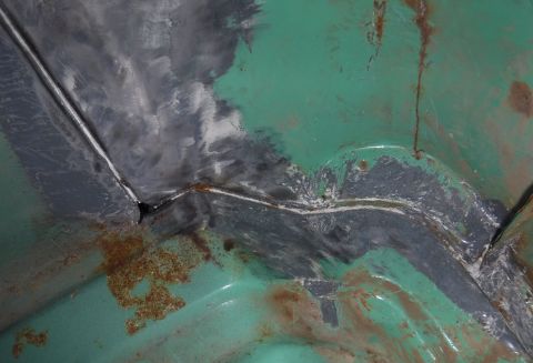 1992 Ford Bronco - Pretty big panel gap at the end of the rear footwell on the driver's side. The passenger side has rusty stress cracks forming there, with i…