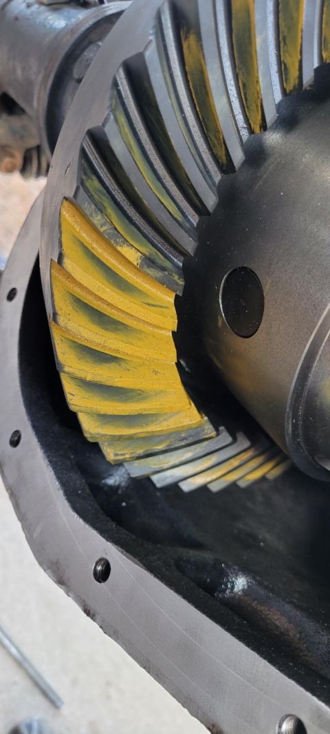 1996 Ford Bronco - Differential gears showing wear patterns and yellow markings.