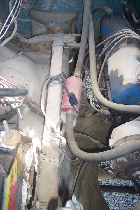 1977 Ford F-150 - Close-up view of the engine bay, showing various mechanical parts and wiring.