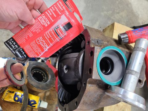 1997 Ford F-250 - I replaced both front axleshaft seals using Hylomar Blue, and sealed the chunk using MotorCraft gray silicone. IF THE IMAGE IS TOO SMALL, c…