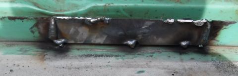 1992 Ford Bronco - Rusty section (right where the weatherstrip splits, not surprisingly) cut out of the driver and passenger sills, and patched with pieces cu…