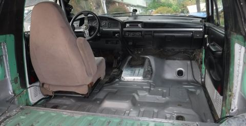 1992 Ford Bronco - I'll add the mat back in after the Rust Bullet has had more time to air out, but for the time being, I really like how the tranny tunnel co…