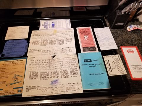 1969 Pontiac Firebird - A collection of automotive documents, including a 1980 GMC Pickups Owner's and Driver's Manual, warranty information, and various service b…