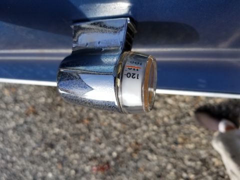 1969 Pontiac Firebird - Exterior temperature gauge with chrome trim is visible on the car's body.