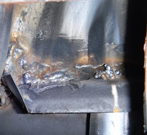 1992 Ford Bronco - Driver's side access hole. Finally enough material on both sides to crank the heat up a bit and fill the welds in for more substantial rein…