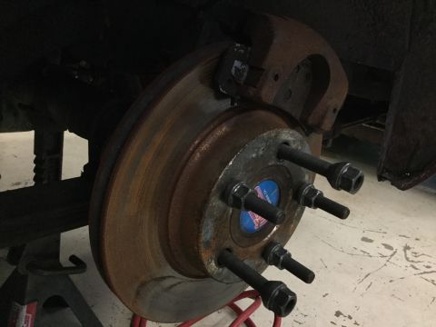 1970 Ford Mustang - D0ZX style rear disk brakes. Uses factory front calipers and rotors.