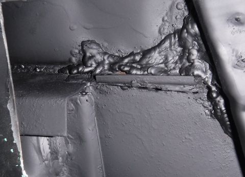 1992 Ford Bronco - Rust Reformer sprayed on the b-pillar inner welds; looks a lot more complete welding-wise now that it's uniform in appearance.