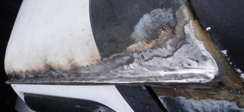 1992 Ford Bronco - Driver's drip rail channel carved. I got most of the porosity out with the final welding passes, but eliminating all the little start/stop…