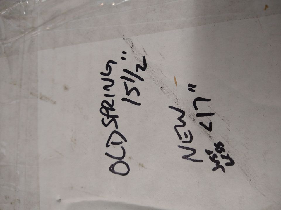 White paper with handwritten text 'OLD SPRING 15 1/2"' and 'NEW L17'
