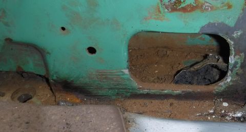 1992 Ford Bronco - Removal of the recently learned of plate that blocks what would otherwise be a great drain at the base of the b-pillars. The thin plate is…