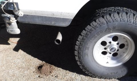 1992 Ford Bronco - Dirt pile from below passenger tail light, alongside 15" rim and 33" tire for perspective. Makes me think the 500-1000 lb discrepancies in…