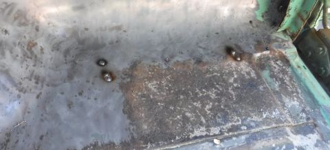 1992 Ford Bronco - Passenger side rear corner screw holes filled. I clipped a copper backer plate to the underside with magnets, and was able to fill them tha…