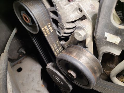 2003 Pontiac Grand Am - The belt seems OK. ACDelco $29 https://www.amazon.com/dp/B00UIO36SG Bando $23 https://www.amazon.com/dp/B000CB0KJ8