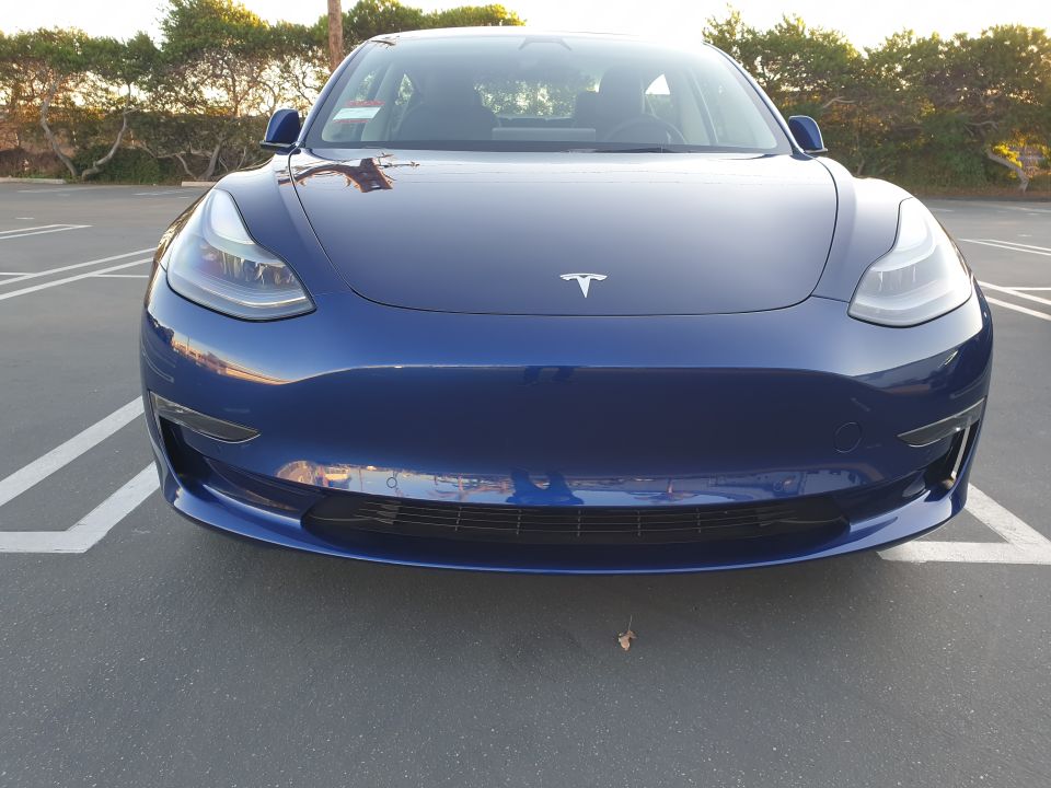 Blue Tesla Model 3 front view