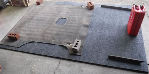 1992 Ford Bronco - My universal, cut-to-fit BedRug arrived, so I dropped what I was doing and flattened it out to get it ready for trimming. I cut it a little…
