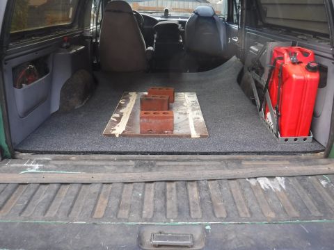 1992 Ford Bronco - BedRug trimmed and test fit. Got it pretty close initially, but trimmed it a bit more around the speaker grilles once installed, for less i…