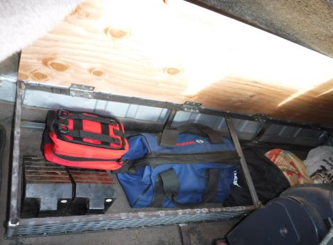 1992 Ford Bronco - 1/2" plywood lid installed, seems plenty strong to kneel or stand on. Front/center latch hanging in place but not yet tied in; could techni…