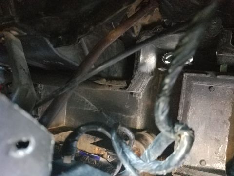 1976 Ford Ranchero - Underside view of a vehicle's heater box assembly, showing ducting and wiring.