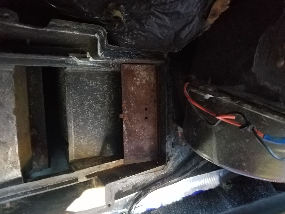 Heaterbox assembly with rusty metal plate and wiring