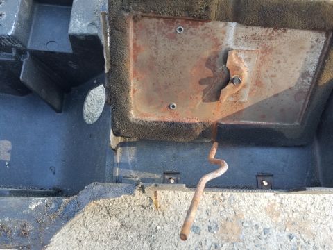 1976 Ford Ranchero - Close-up of a vehicle's heater box assembly, showing internal components and signs of rust.