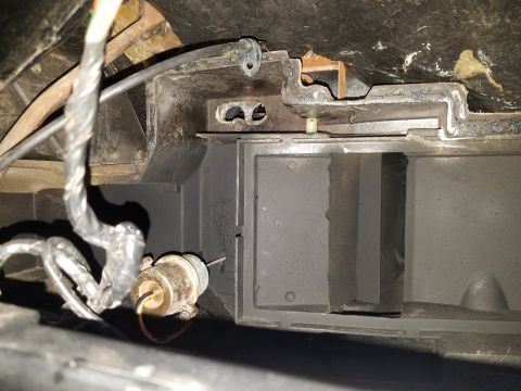 1976 Ford Ranchero - Close-up of vehicle heater box ducting and wiring, showing internal components.