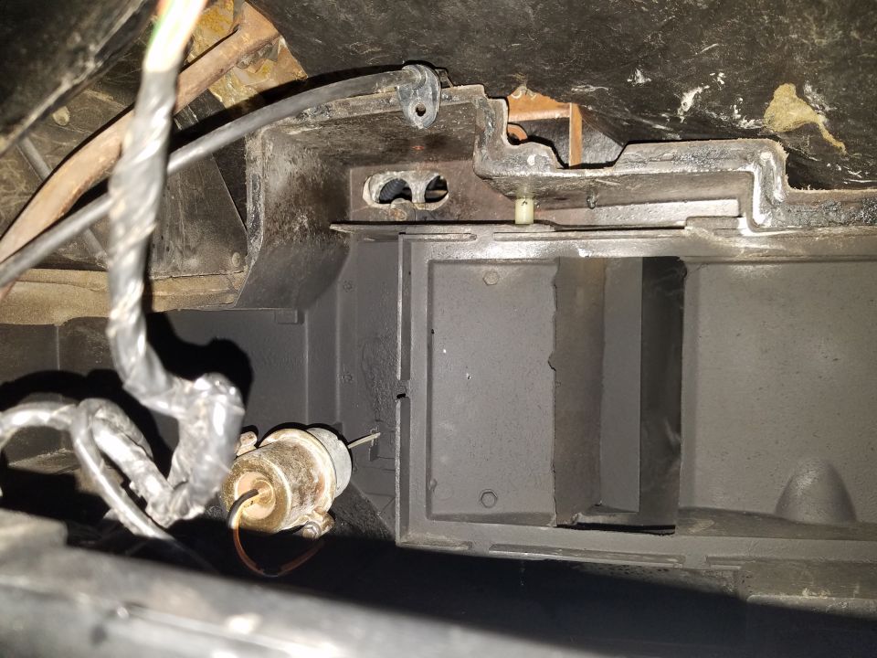 heater box ducting and wiring with a small cylindrical component attached