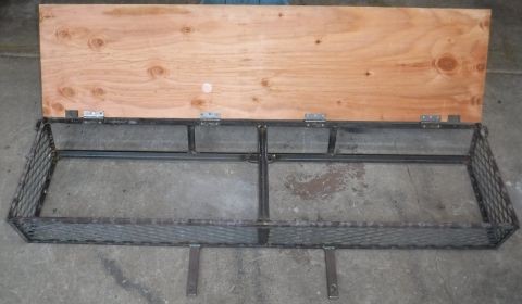 1992 Ford Bronco - D-ring tie-downs added at the rear corners, cable lock loop added at lower rear, notches cut in plywood for upper anchors.