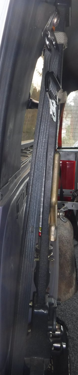 1992 Ford Bronco - Tweaked the Hi-Lift mount to allow it to sit closer to vertical. The climbing pins were interfering with my rear footwell storage box's lid…