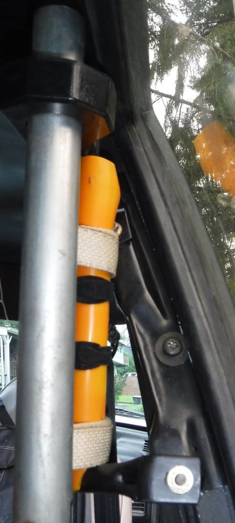 1992 Ford Bronco - Rear view of the modified mount. Bolting it together is trickier now, as is getting the top velcro strap on or off. I need to get a 3/4" ID…