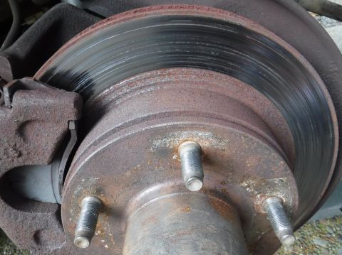 1992 Ford Bronco - Pulled the passenger side wheel to try out the EBC brake pads, only to discover a heavily scored rotor. (The driver's side is fine; I could…