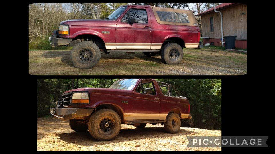 Red 1996 Ford Bronco with tan soft top, lifted suspension, and aftermarket bumper parked on dirt