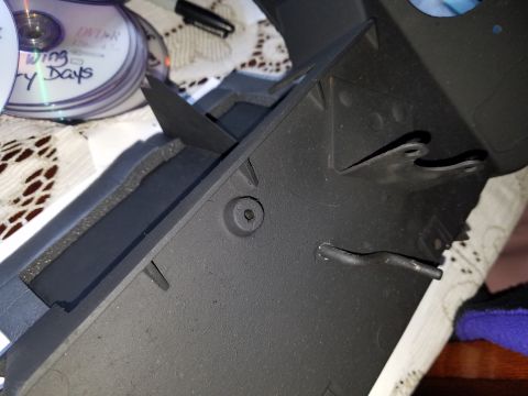 1976 Ford Ranchero - A black plastic heaterbox part is shown with some CDs and a marker in the background.